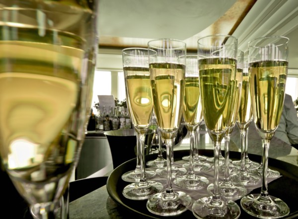 Chapmagne flutes on tray in restaurant. Photo : DKAR Images