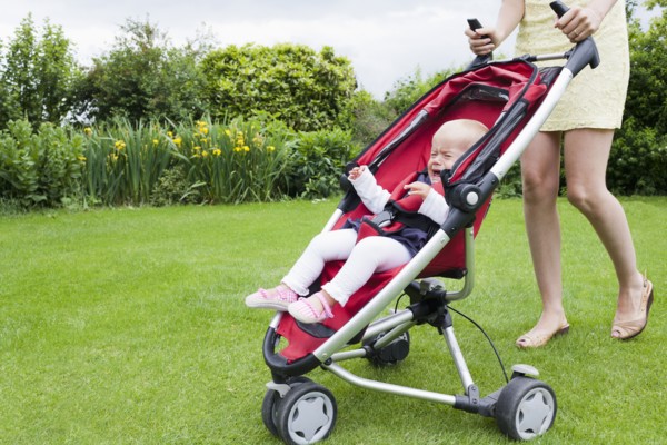 Girl in pram crying during walk. Photo: Mark de Leeuw
