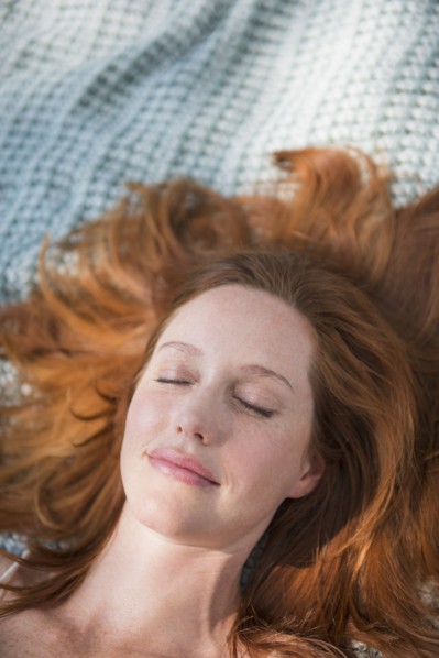 Portrait of woman sleeping. Photo : Tetra Images