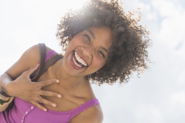 Portrait of woman laughing.