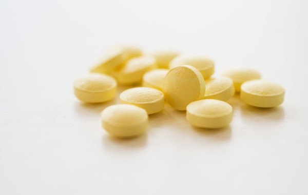 Yellow pills, studio shot.