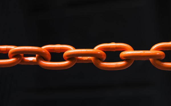 Chain on black background, studio shot.