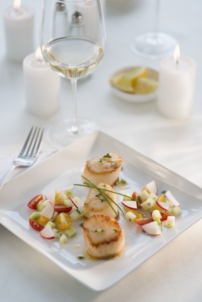 Seafood on plate in restaurant.