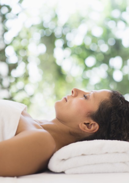 Woman relaxing in spa.