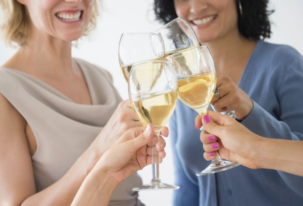 Women drinking white wine. Photo: Jamie Grill