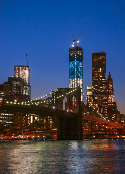 View over Hudson River towards Manhattan with Freedom Tower One and Brooklyn Bridge. Photo : Daniel