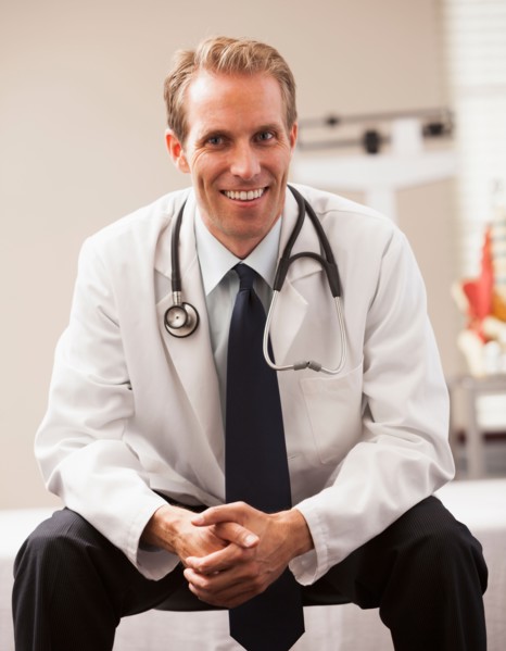 Portrait of doctor smiling. Photo : Mike Kemp