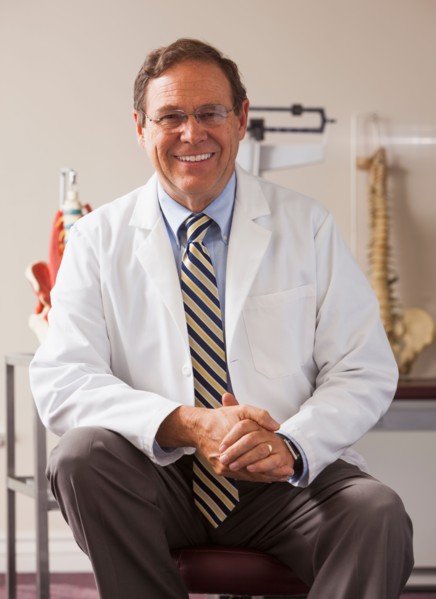 Portrait of doctor in his office. Photo: Mike Kemp