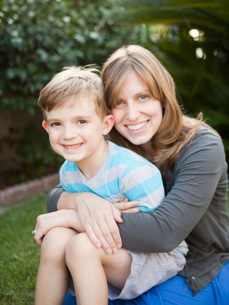 Portrait of mother holding her son (6-7). Photo : Jessica Peterson