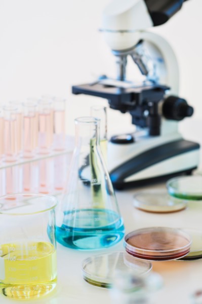 Beakers and microscope.