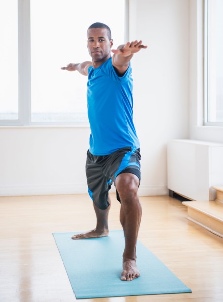 Young man practicing yoga