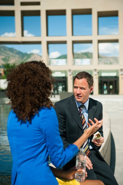 Man and woman taking lunch brake outdoors