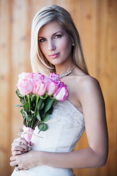 Portrait of bride holding bouquet
