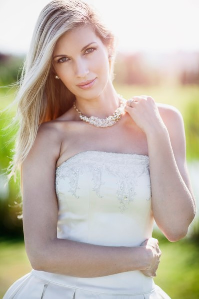 Portrait of bride posing outdoors