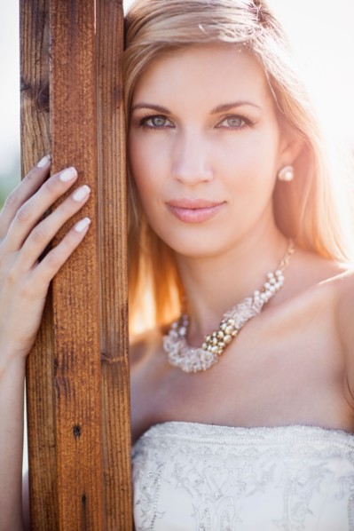 Portrait of bride posing outdoors