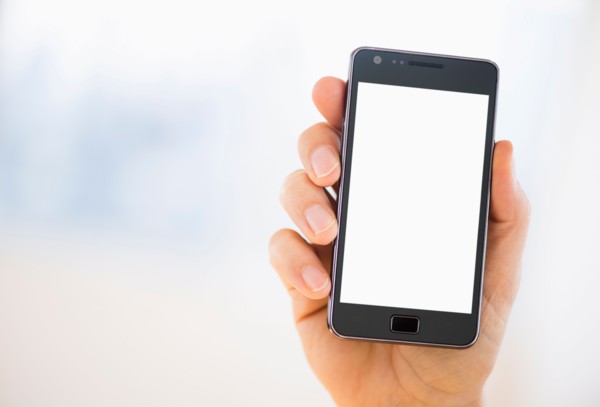 Hand holding smartphone.