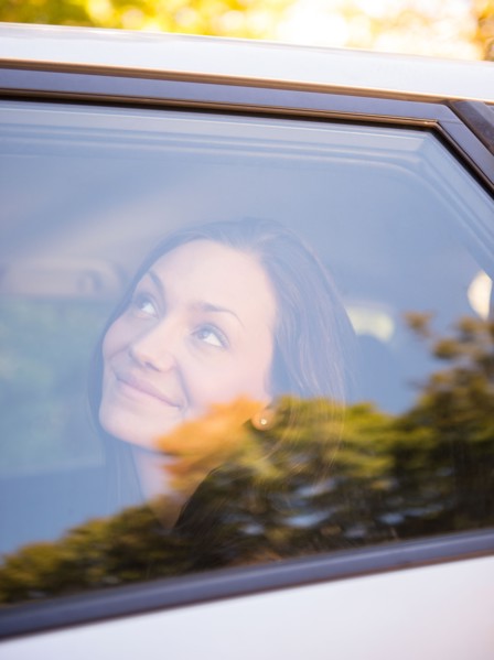 Woman in car. Photo : Jamie Grill