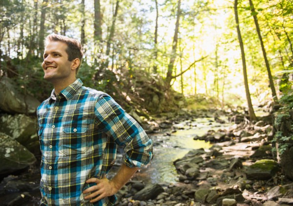 Man standing in forest. Photo: Jamie Grill