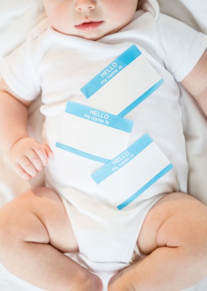 Identity labels belly of baby boy (2-5 months). Photo : Jamie Grill