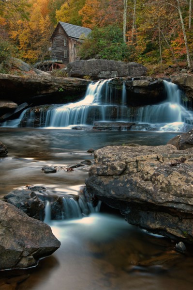 Mill on creek in forest. Photo : Henryk Sadura