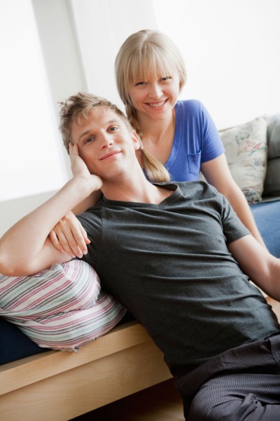 Portrait of couple in bedroom. Photo : Rob Lewine