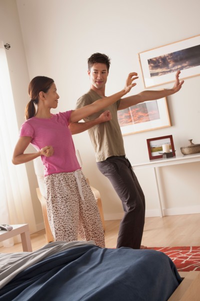 Couple practicing tai chi. Photo: Rob Lewine