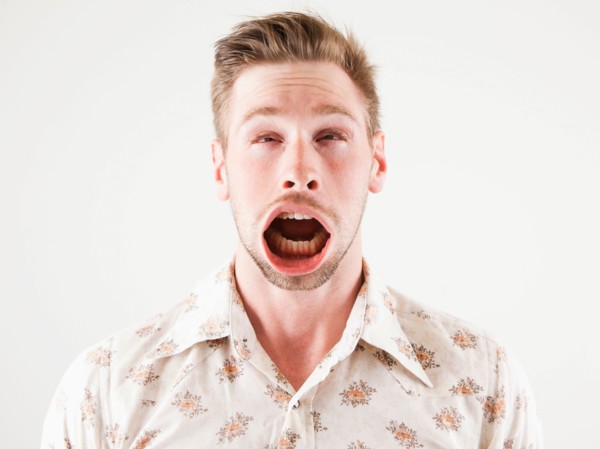 Studio shot of man with windblown mouth. Photo: Jessica Peterson