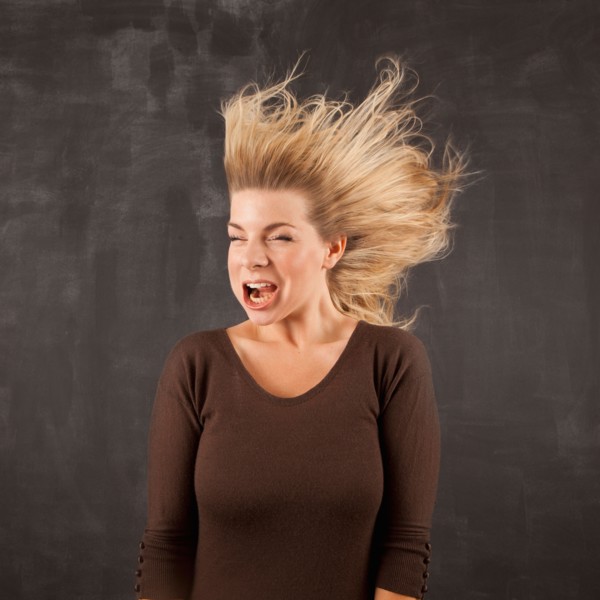 Studio shot of woman with windblown mouth. Photo: Jessica Peterson