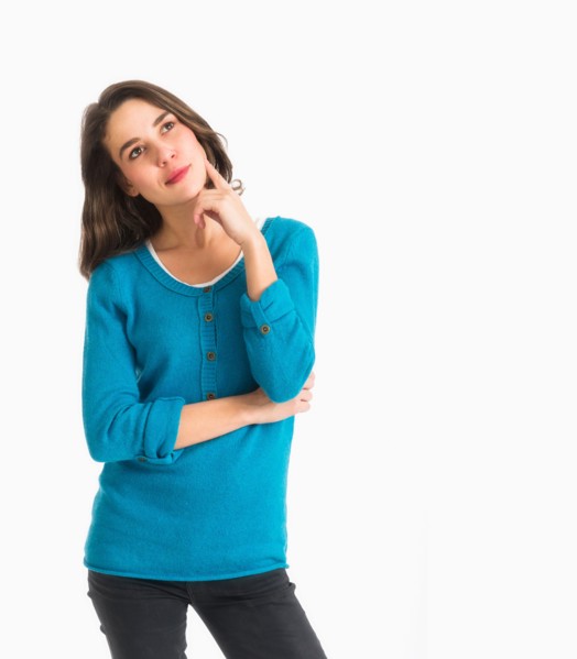Studio shot of pensive young woman.