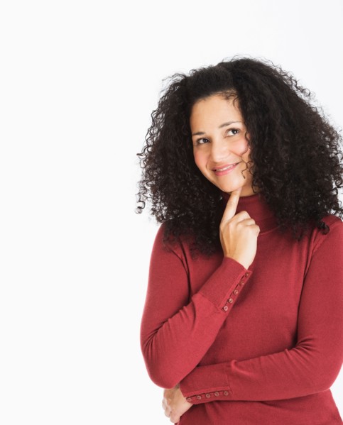 Studio portrait of mid adult woman.