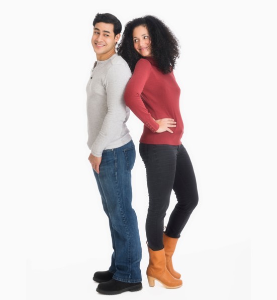 Studio portrait of young couple.