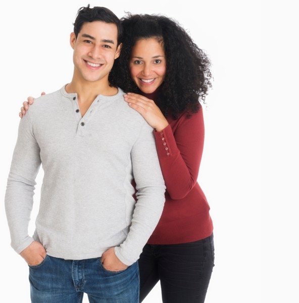 Studio portrait of young couple.