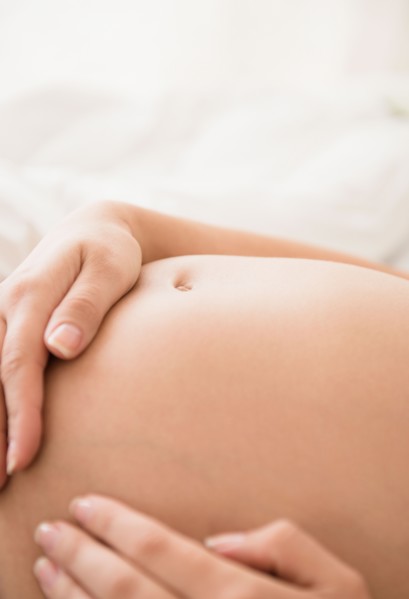 Close-up of pregnant woman's belly