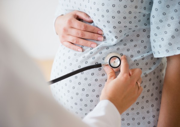 Pregnant woman during examination