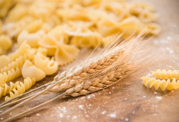 Different types of pasta and wheat ear