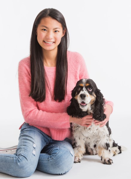 Portrait of teenage girl ( 16-17 years) with dog