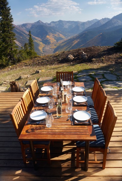 Outdoor table and chairs on wooden terrace