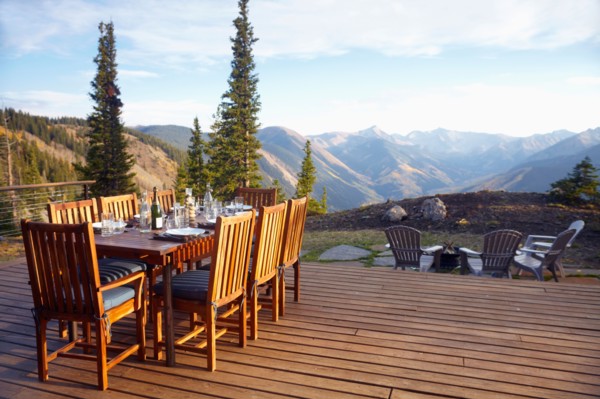 Outdoor table and chairs on wooden terrace