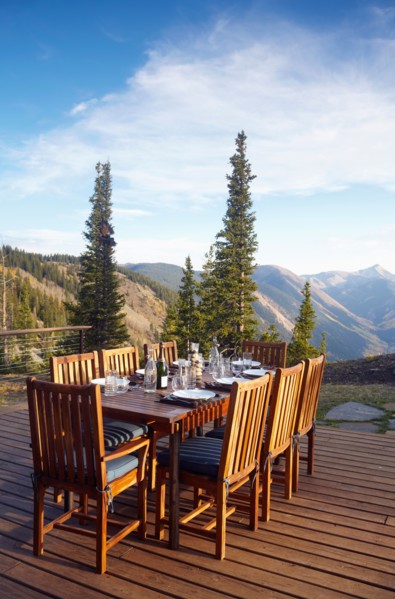 Outdoor table and chairs on wooden terrace