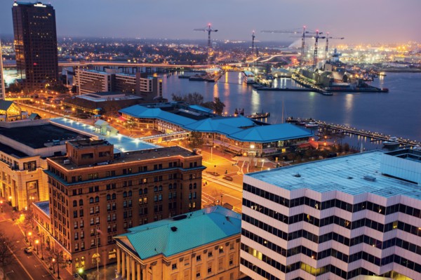 Cityscape with cranes at night