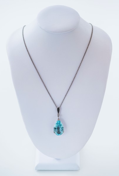 Studio shot of beautiful necklace with blue stone