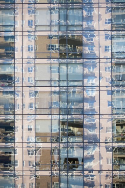 Reflection on glass skyscraper