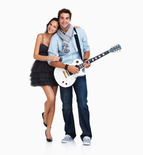 Studio Shot, Young woman embracing guitarist