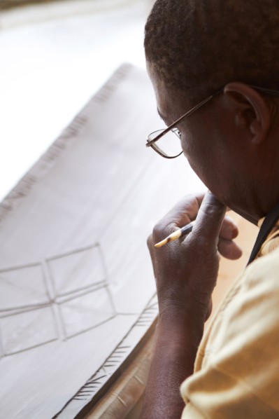 Man concentrating on design