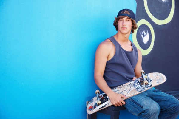 Portrait of male skateboarder