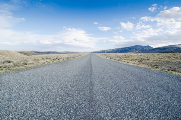 Road going through desolate landscape