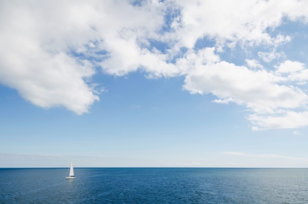 Lonely sailboat on ocean