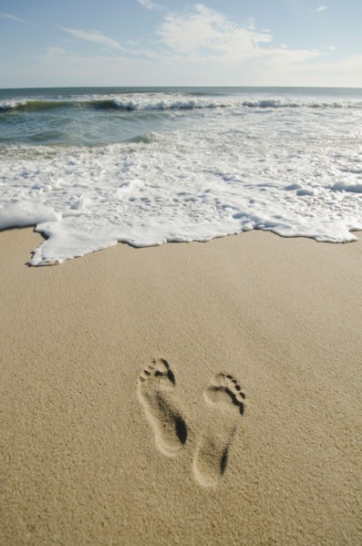 Footprints on sandy beach