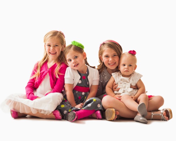 Portrait of four sisters (18-23 months, 2-3, 6-7)
