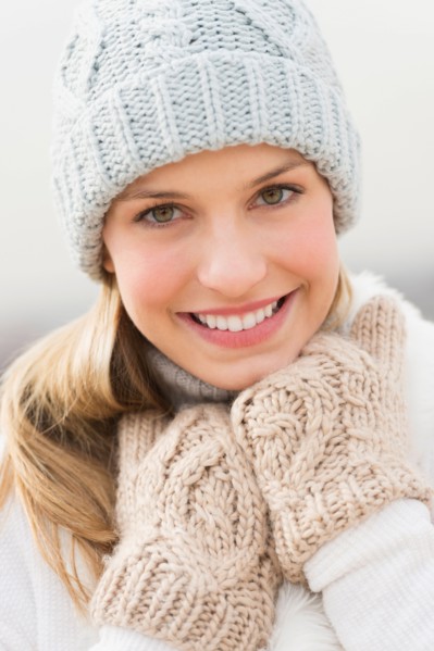 Portrait of young woman in winter clothing.